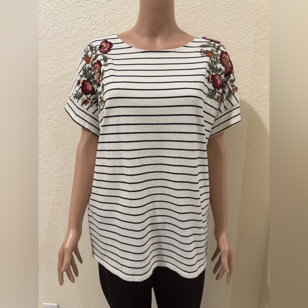 A cute striped t-shirt with a floral design on the shoulders from Chico’s!